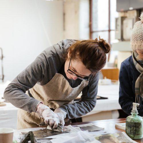 Two people making crafts at Sunny Bank Mills, Yorkshire