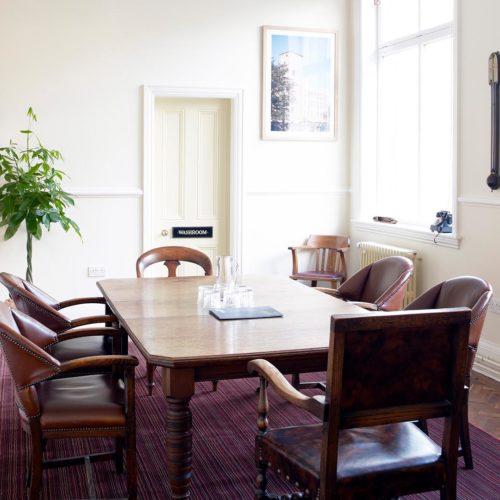 Meeting room with table and chairs at Sunny Bank Mills Leeds