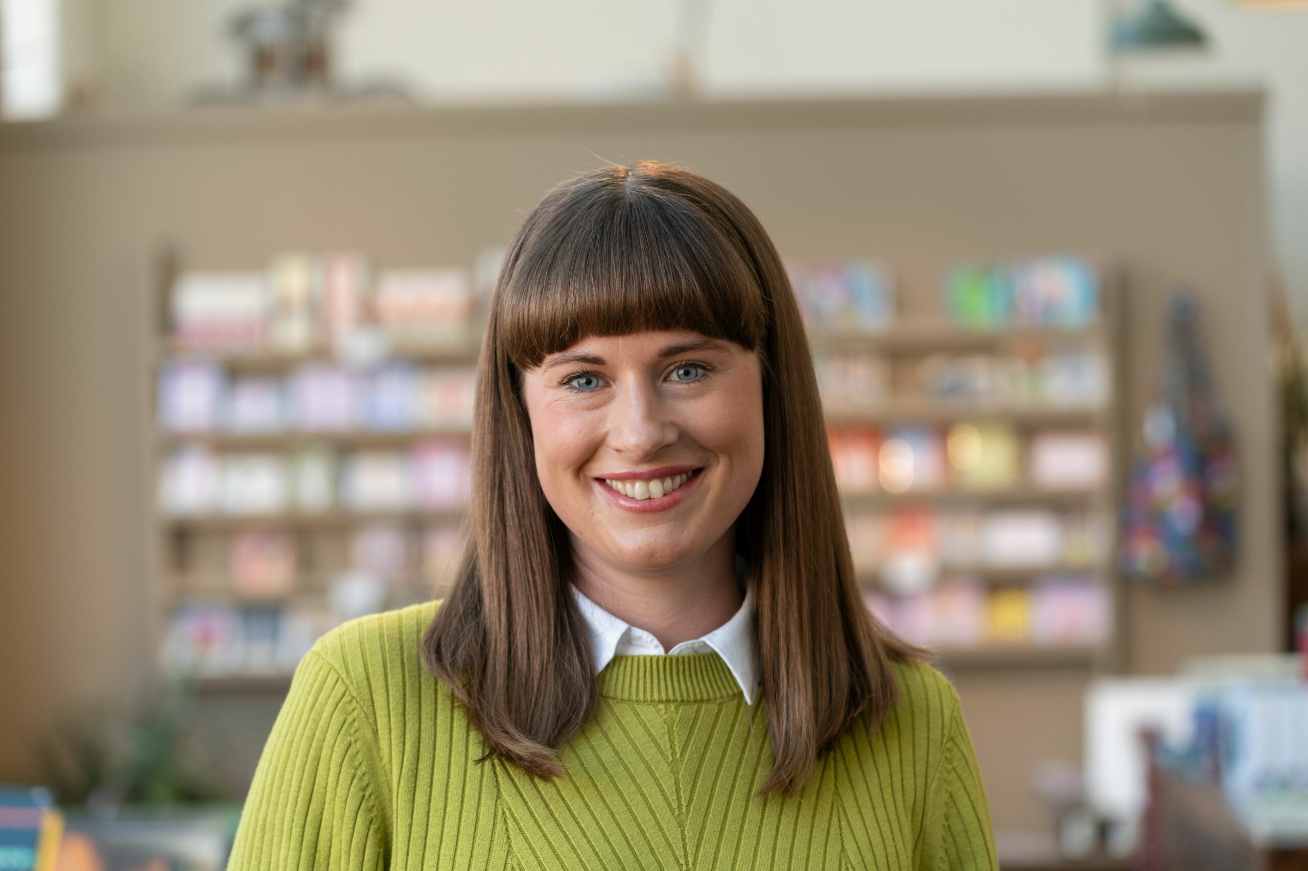 A woman smiling at the camera - Anna Turzynski, Arts Director, Sunny Bank Mills