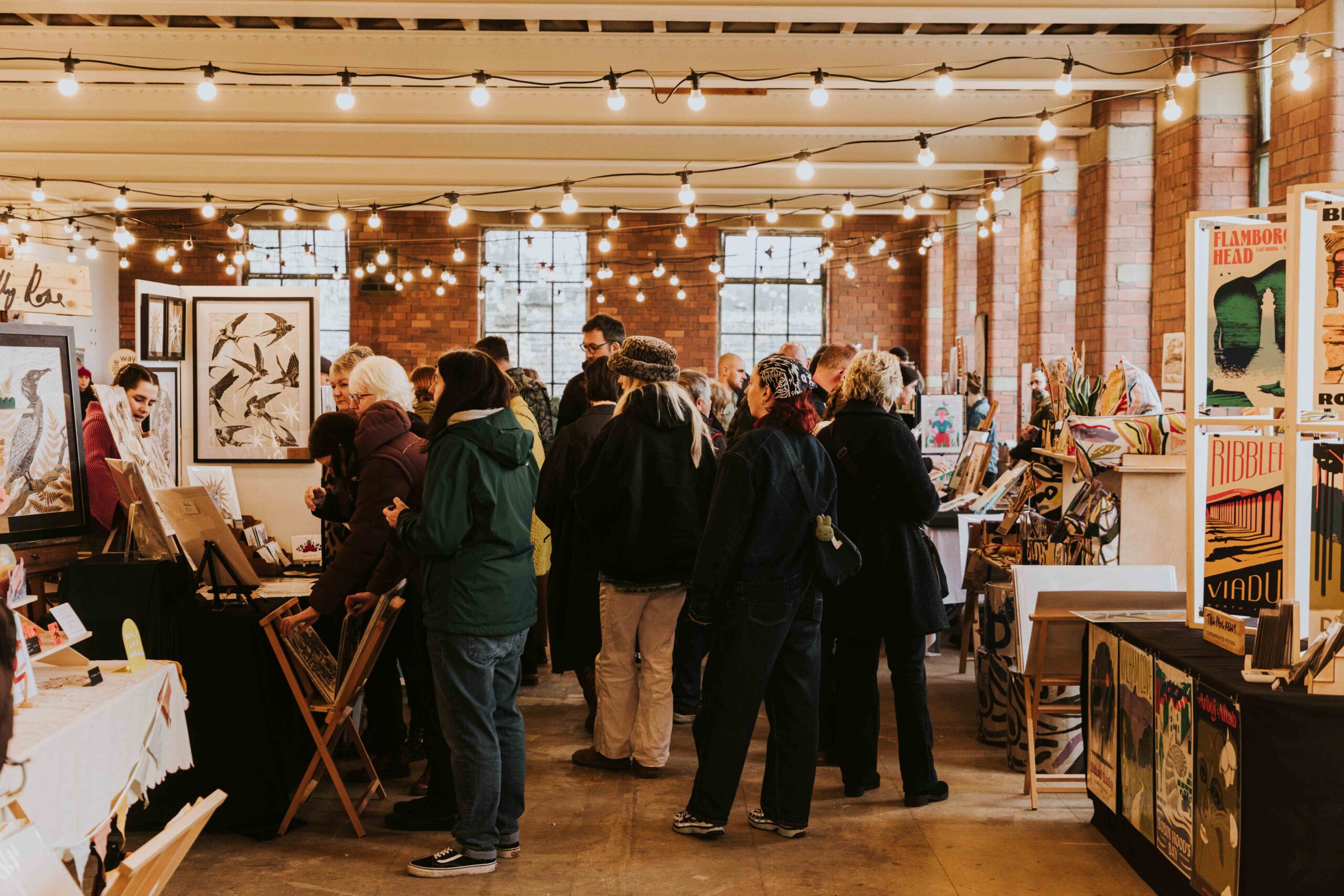 A large group of people in the Print Fair at Sunny Bank Mills