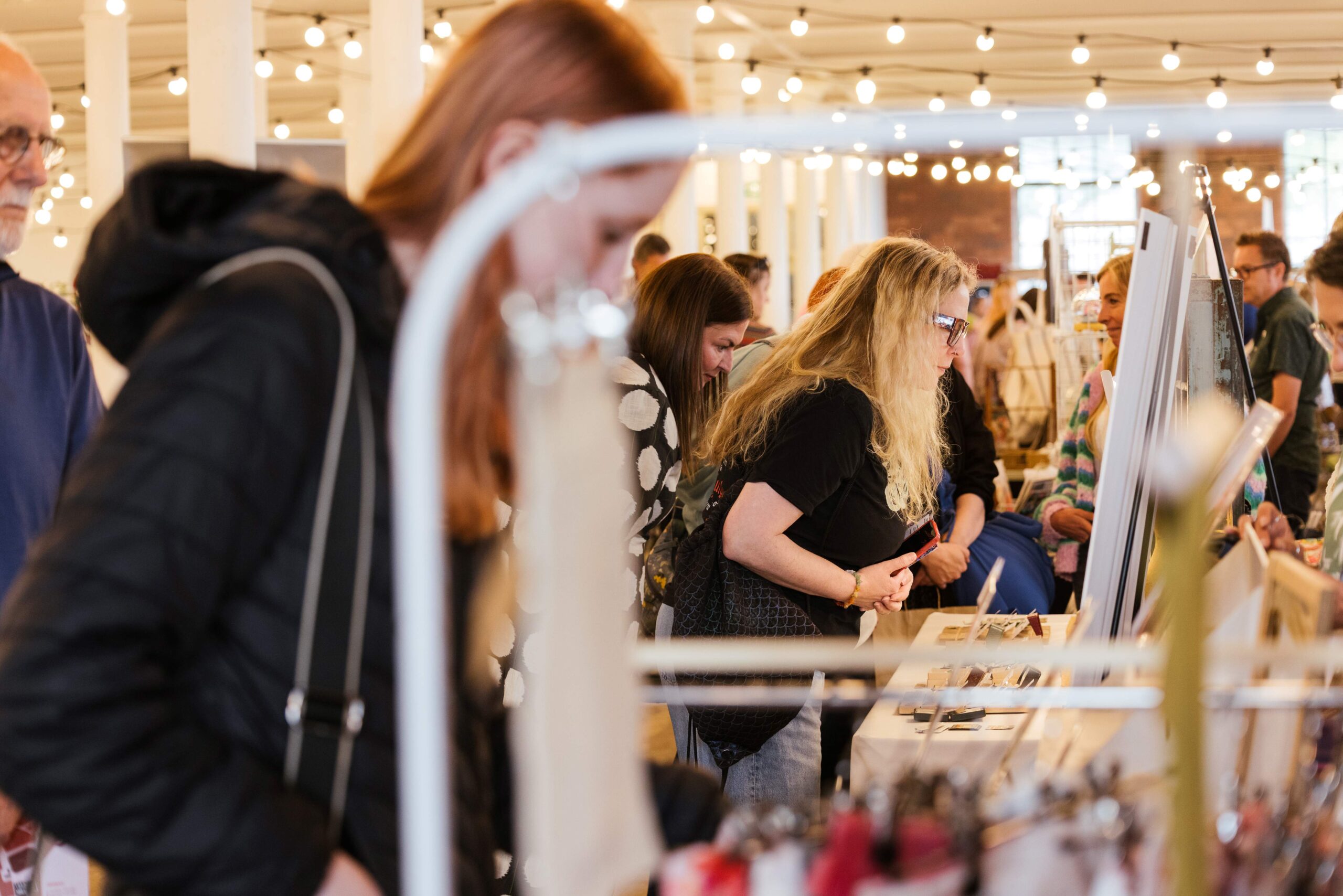 People in the busy Threads textile market at Sunny Bank Mills